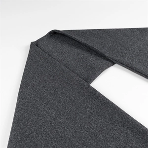 Macro shot of dark grey wool blend fabric texture for elegant women scarf coat