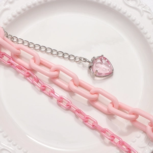 Pink double-layer acrylic waist chain featuring a heart pendant and strawberry-style charms