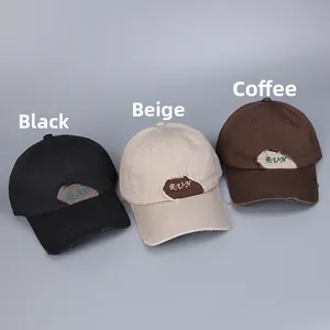 Detailed view of distressed cotton baseball caps with RUN embroidery in black, beige and coffee