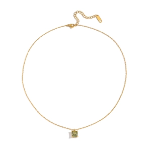 Detail of gold square green zircon pendant necklace with a Lucky logo tag