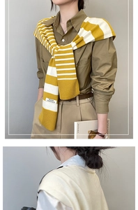 Detailed shot of striped knitted shawl scarf, versatile shoulder protector women outerwear.