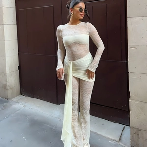 Women's cream lace two-piece set featuring a long sleeve slim top and flared trousers