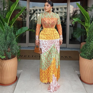 Elegant high-neck long sleeve maxi dress with multicolor print and fitted waist design