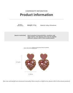 Close-up of pink heart drop earrings with rhinestones, sized 2.5cm by 1.5cm