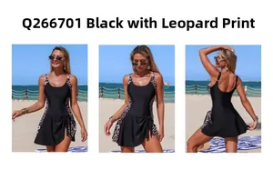 Detailed views of a black skirtini swimsuit with leopard print panels on beach