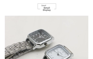 Detail view of square dial quartz watches in black and white with metal link straps