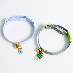 Polka dot pet collars with bell and pendants including milk bottle and cactus designs