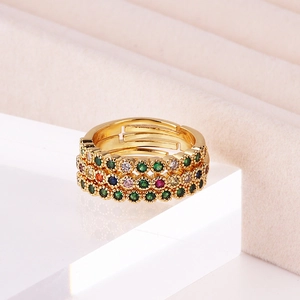 Detail of adjustable 18K gold plated ring featuring colorful set zircon gemstones