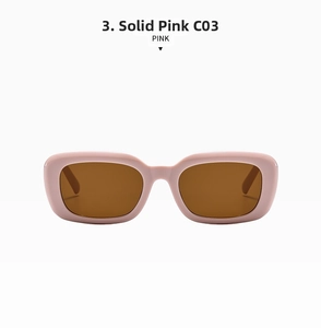 Detail of solid pink rectangular sunglasses with brown lenses on a white background
