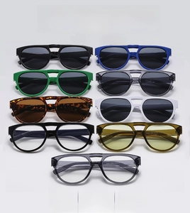 Detailed display of retro double-bridge sunglasses in nine trendy assorted colors