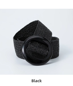 Close-up detail of the woven texture and large black resin buckle on the stretch belt