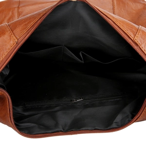 Brown faux leather crossbody bag with interior pockets and high-capacity main compartment