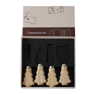 Detailed view of 4-piece stainless steel cheese knife set with Christmas tree wood handles