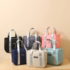 Front view of six insulated lunch bags in assorted colors with waterproof fabric