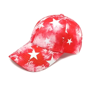 Detail of red and white tie-dye baseball cap featuring printed white pentagram stars