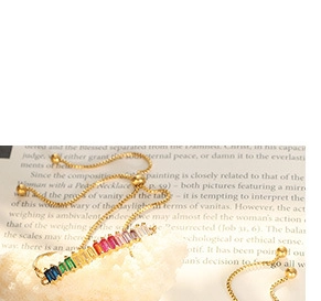 Adjustable gold bracelet featuring a gradient row of colorful baguette-cut zircon stones