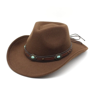 Vintage dark brown cowboy hat in wool felt featuring a turquoise studded leather band