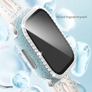 Boîtier Apple Watch bleu pailleté avec strass et bracelet en silicone rose élégant