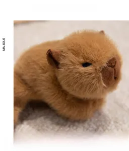 Close-up of soft brown capybara plush toy with high-quality thick faux fur texture