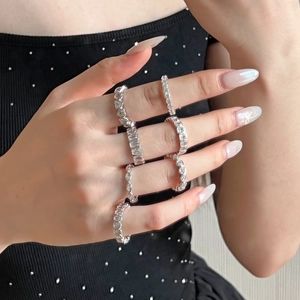 Elegant S925 sterling silver heart and geometric diamond rings layered on model