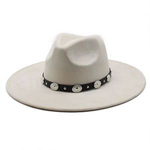 Detail of light beige fedora hat featuring a black leather band with silver metal conchos