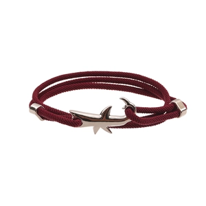 Milanese burgundy braided rope bracelet with metallic shark-shaped buckle and slider clasp