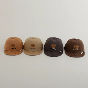 Baby cotton baseball caps with bear embroidery and Lucky lettering in earth tones