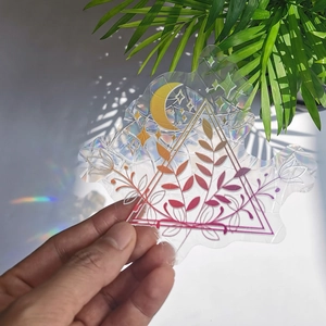 Rainbow prism effect from holographic crescent moon and stars suncatcher sticker
