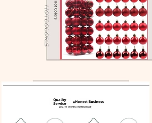 Detailed macro view of assorted red Christmas balls with glittery and matte finishes