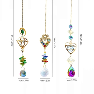 Three-piece colorful crystal heart suncatcher set with golden metal frames and prisms