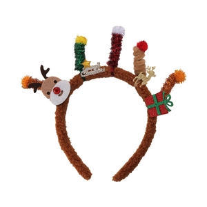 Detail of plush Christmas headband with reindeer, gift box and Merry Christmas plaque