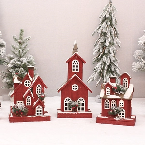Set of 3 red wooden Christmas house ornaments with snow details and pine accents