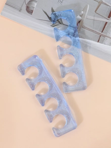 Soft silicone toe separators with blue glitter for nail polish and foot care pedicure