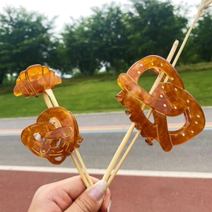 Pinces à cheveux en acétate ambré en forme de croissant et bretzel pour femmes en plein air