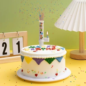 Musical candy firework birthday candle with confetti spray effect on a cake