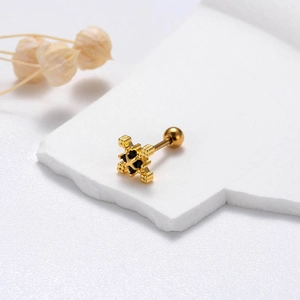 Detail of golden cross ear stud with black zircon inlay and screw ball back design