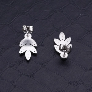 Minimalist silver leaf stud earrings with brushed stainless steel finish and push-back