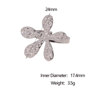 Detailed view of silver flower ring with hammered texture and 24mm diameter size marks