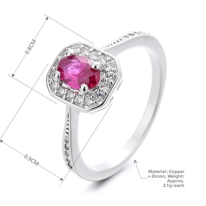 Macro detail of rectangle pink zircon ring in silver copper setting with pavé diamonds