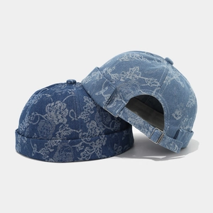 Vintage washed denim docker hats with floral patterns and adjustable metal buckles