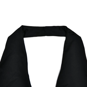 Detailed view of the halter neckline on a black backless fishtail dress for women