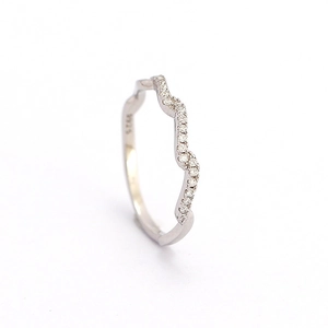 Minimalist S925 sterling silver wavy ring with small zircons on a white background