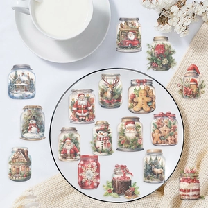 Gros plan de stickers de Noël étanches avec motifs de bocaux sur une assiette blanche