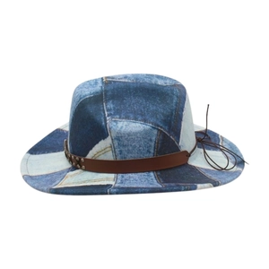 Vintage patchwork denim cowboy hat with brown leather band and rustic rivet details