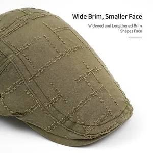 Vintage army green newsboy cap featuring distressed quilted check pattern and wide brim