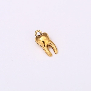 Golden vintage alloy tooth pendant for DIY jewelry and charm bracelets