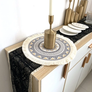 Bohemian round cotton linen placemat with geometric patterns and tassel edges for table decor