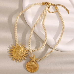 18K gold plated stainless steel necklaces with sun and seashell pendants on braided rope