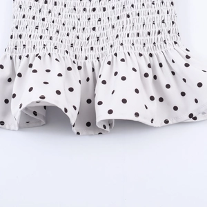 French vintage polka dot sleeveless top with smocked waist and ruffled hem for women