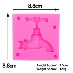 Pink silicone faucet mold for chocolate cake decorating with dimensions 8.8cm and 129g